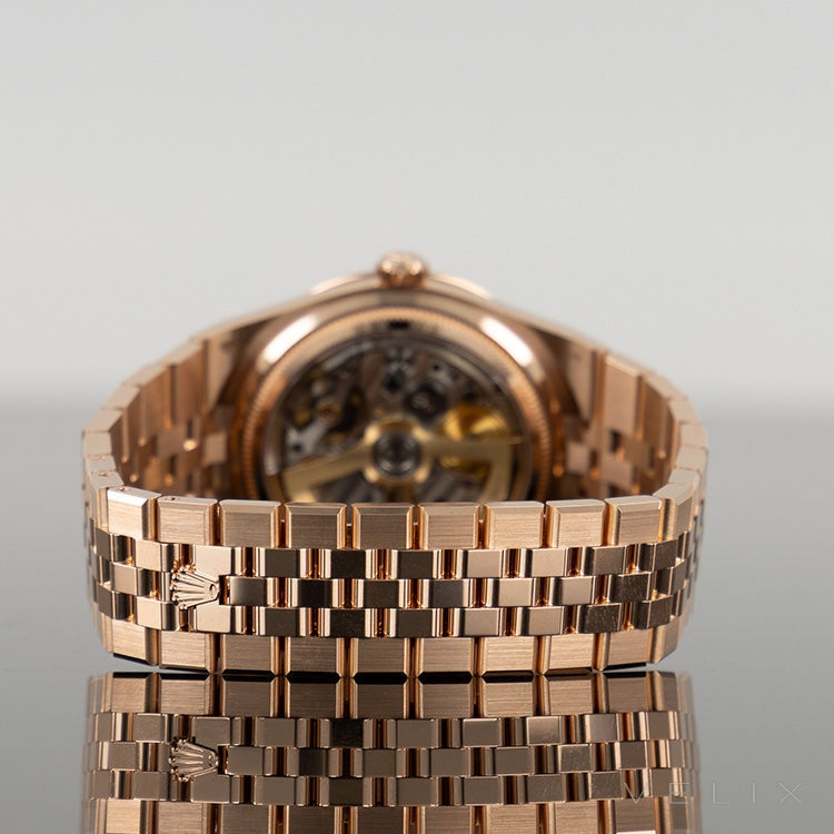 Rolex Land Dweller Rose 127385TBR — Gold Honeycomb Motif Baguette Dial Rose Gold Diamond Baguette 40mm