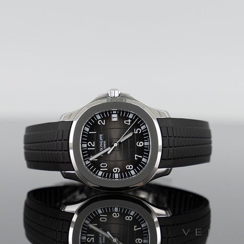 Patek Philippe Aquanaut — Black Dial Steel 40.8mm