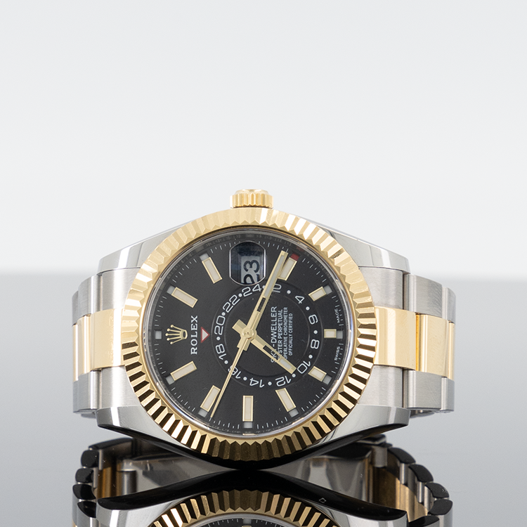 Rolex Sky-Dweller 336933 — Gold Black Dial Yellow Gold Steel 42mm