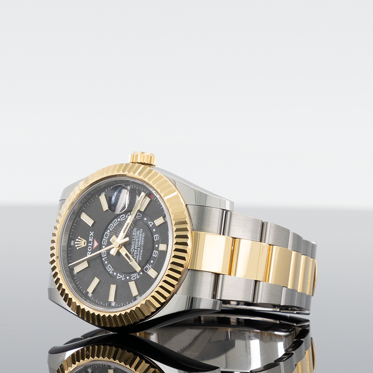 Rolex Sky-Dweller 336933 — Gold Black Dial Yellow Gold Steel 42mm
