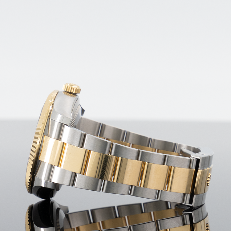 Rolex Sky-Dweller 336933 — Gold Black Dial Yellow Gold Steel 42mm