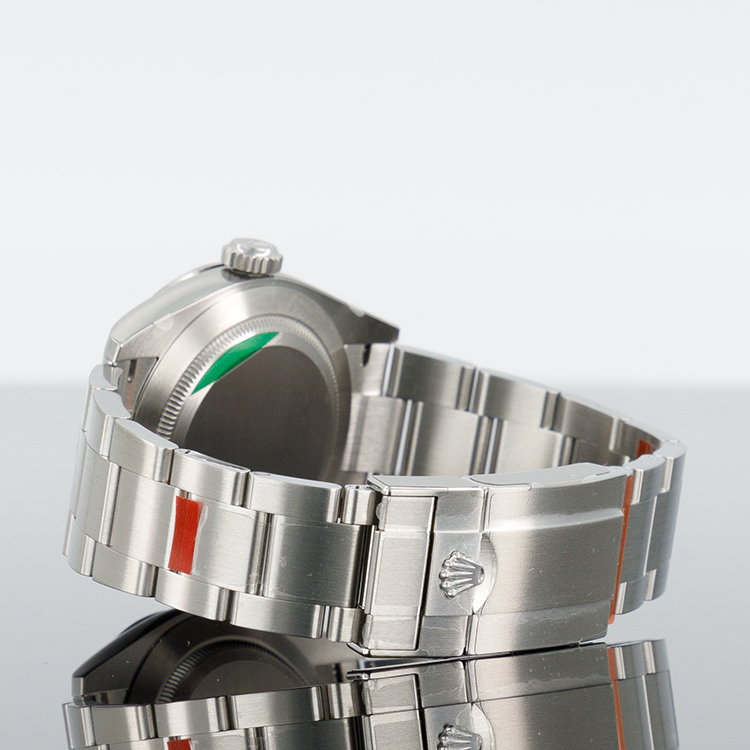 Rolex Oyster Perpetual 124270 — Black Dial Steel 40mm