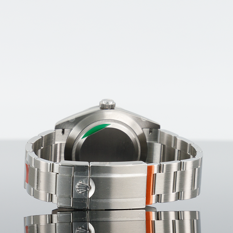 Rolex Oyster Perpetual 124270 — Black Dial Steel 40mm