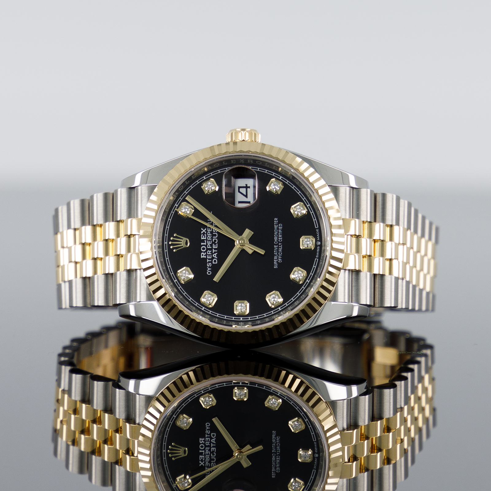 Rolex Datejust 126233 — Gold Fluted Black Diamond Dial Yellow Gold Steel Diamond 36mm