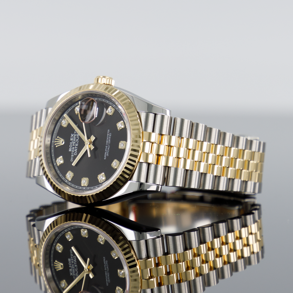 Rolex Datejust 126233 — Gold Fluted Black Diamond Dial Yellow Gold Steel Diamond 36mm