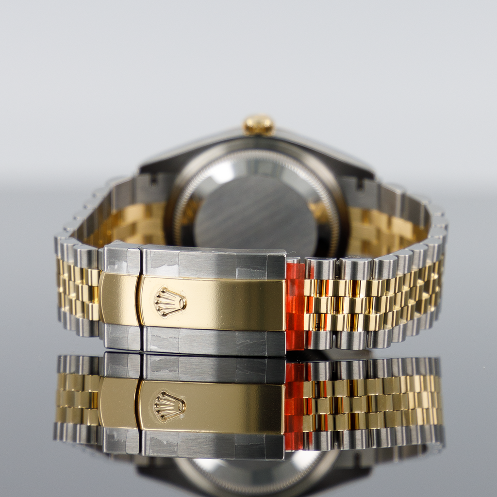 Rolex Datejust 126233 — Gold Fluted Black Diamond Dial Yellow Gold Steel Diamond 36mm