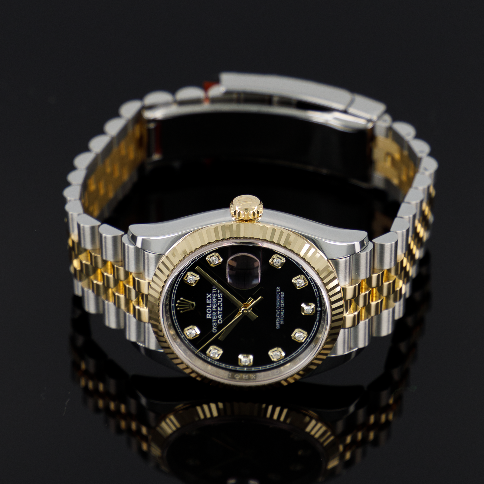 Rolex Datejust 126233 — Gold Fluted Black Diamond Dial Yellow Gold Steel Diamond 36mm