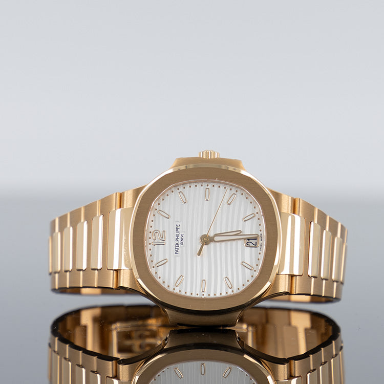 Patek Philippe Nautilus 7118/1R — Rose Gold Silvery Opaline Dial Rose Gold 35.2mm