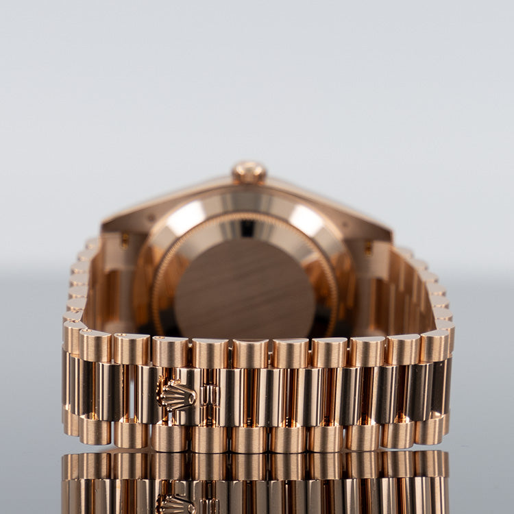 Rolex Day-Date 228235 — Rose Gold Baguette Eisenkiesel Dial Rose Gold Baguette 40mm