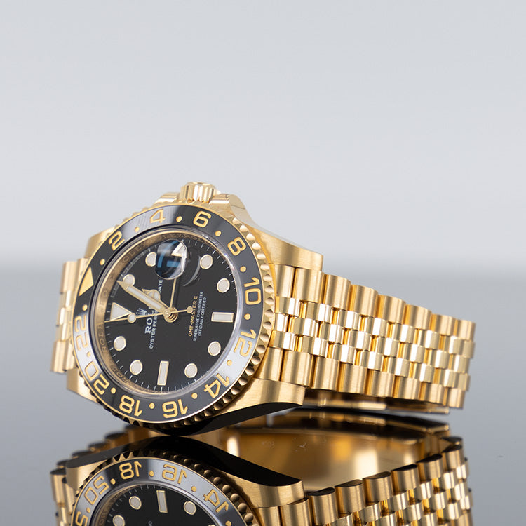 Rolex GMT-Master II 126718GRNR — Black Dial Yellow Gold Jubilee 40mm