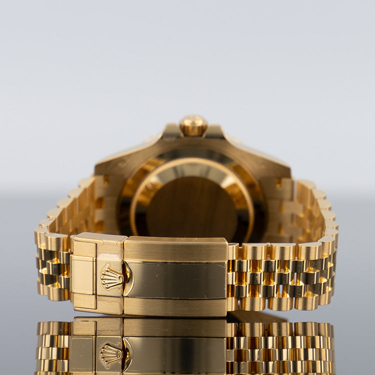 Rolex GMT-Master II 126718GRNR — Black Dial Yellow Gold Jubilee 40mm