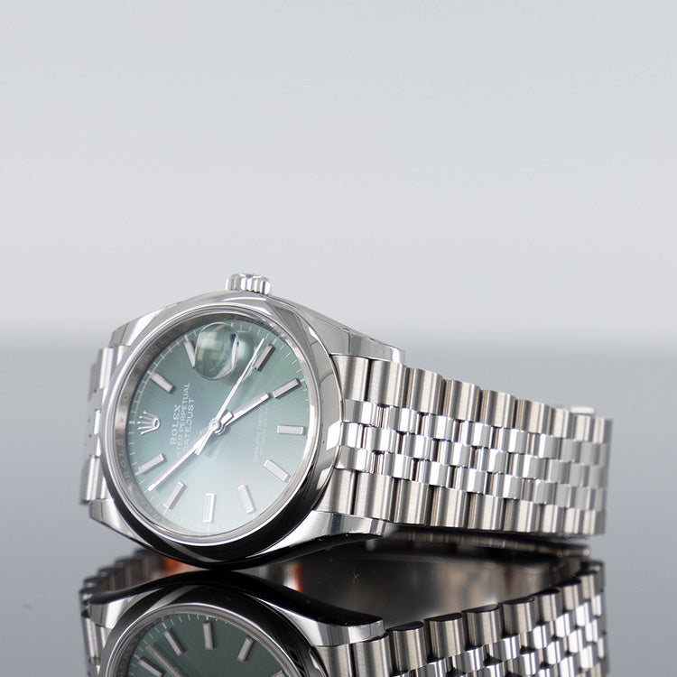 Rolex Datejust 126200 — Green Dial Steel Jubilee 36mm
