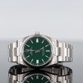Rolex Oyster Perpetual 126000 — Green Dial Steel 36mm