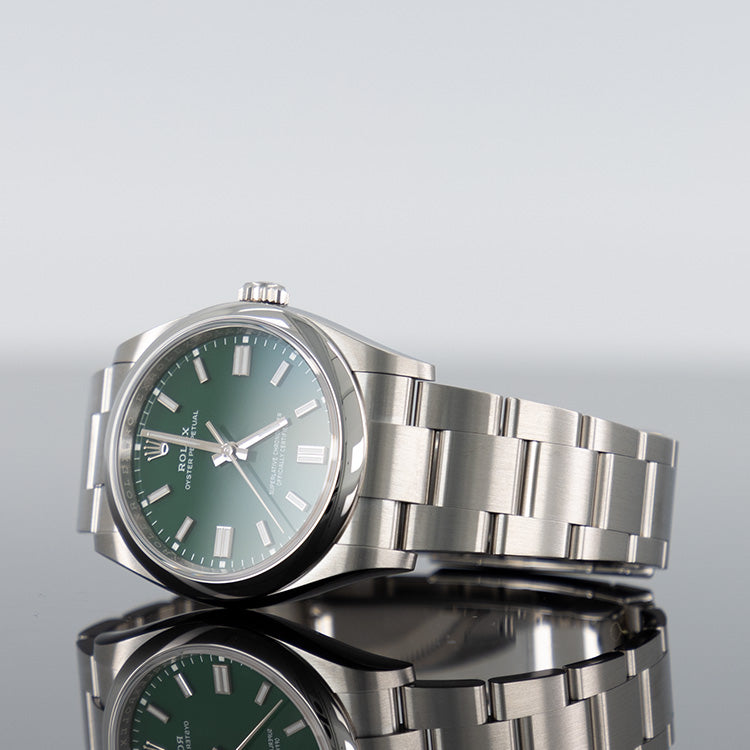Rolex Oyster Perpetual 126000 — Green Dial Steel 36mm