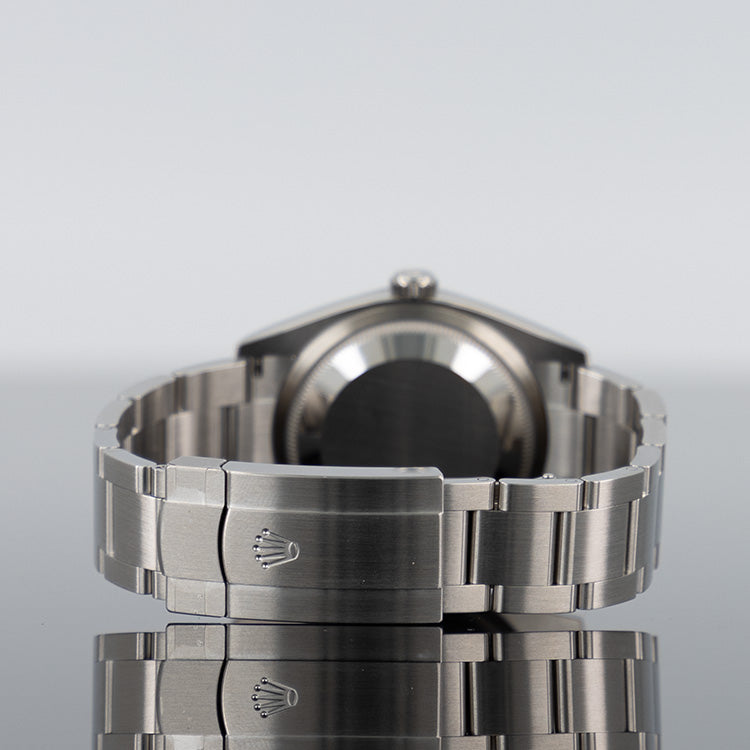 Rolex Oyster Perpetual 126000 — Green Dial Steel 36mm