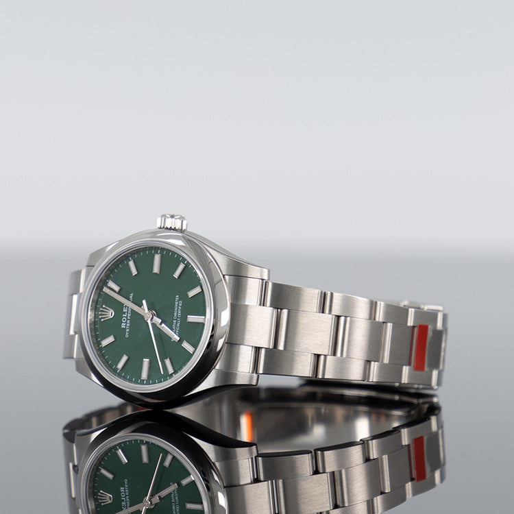 Rolex Oyster Perpetual 277200 — Green Dial Steel 31mm