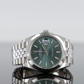 Rolex Datejust 126300 — Green Index Dial Steel Jubilee 41mm