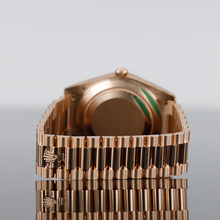 Rolex Day-Date 228345 — Green Roman Dial Rose Gold Diamond 40mm