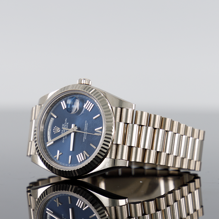 Rolex Day-Date 228239 — Gold Arabic Blue Roman Dial White Gold 40mm