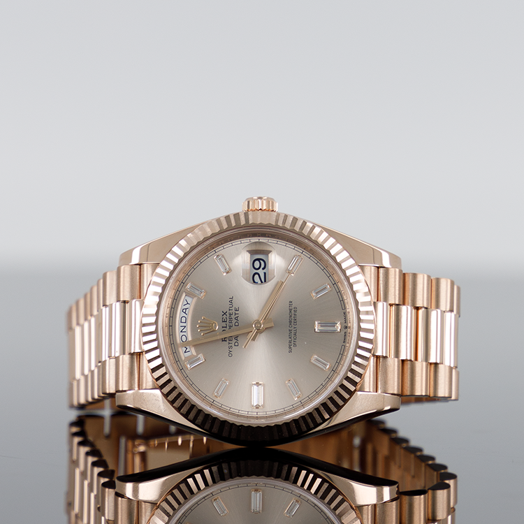 Rolex Day-Date 228235 — Rose Gold Sundust Baguette Dial Rose Gold Baguette 40mm