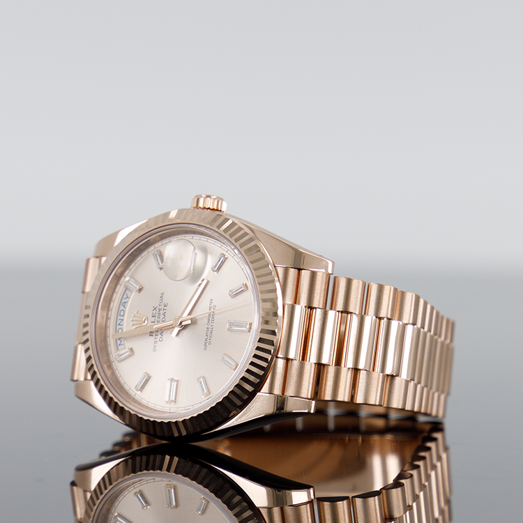 Rolex Day-Date 228235 — Rose Gold Sundust Baguette Dial Rose Gold Baguette 40mm
