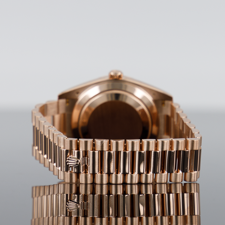 Rolex Day-Date 228235 — Rose Gold Sundust Baguette Dial Rose Gold Baguette 40mm