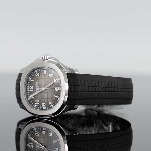 Patek Philippe Aquanaut — Black Dial Steel 40.8mm