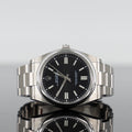 Rolex Oyster Perpetual 124300 — Black Dial Steel 41mm