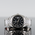 Rolex Datejust 126234 — Black Index Dial Steel Jubilee 36mm
