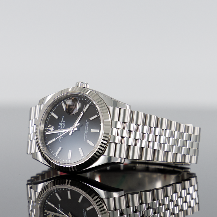 Rolex Datejust 126234 — Black Index Dial Steel Jubilee 36mm