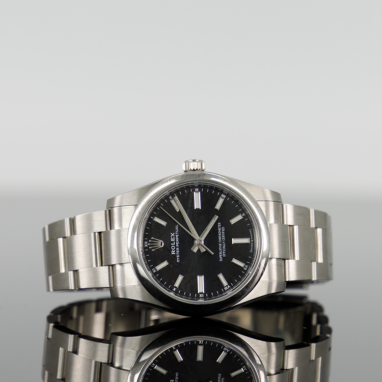 Rolex Oyster Perpetual 124200 — Black Dial Steel 34mm