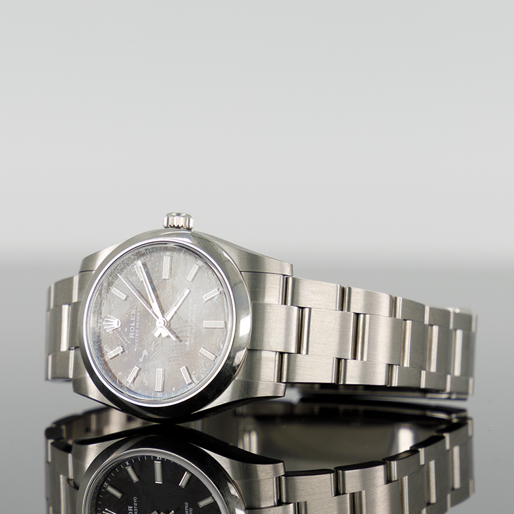 Rolex Oyster Perpetual 124200 — Black Dial Steel 34mm