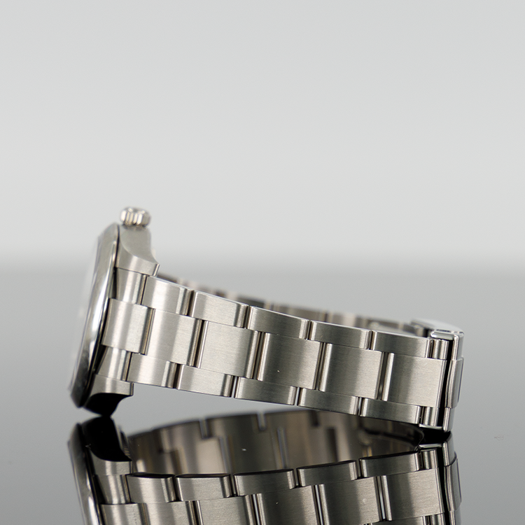 Rolex Oyster Perpetual 124200 — Black Dial Steel 34mm