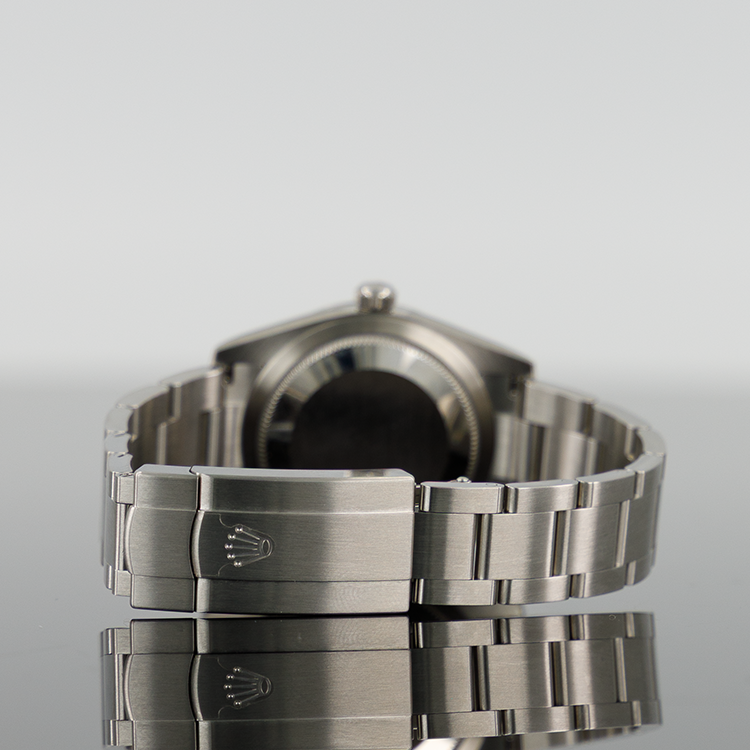 Rolex Oyster Perpetual 124200 — Black Dial Steel 34mm