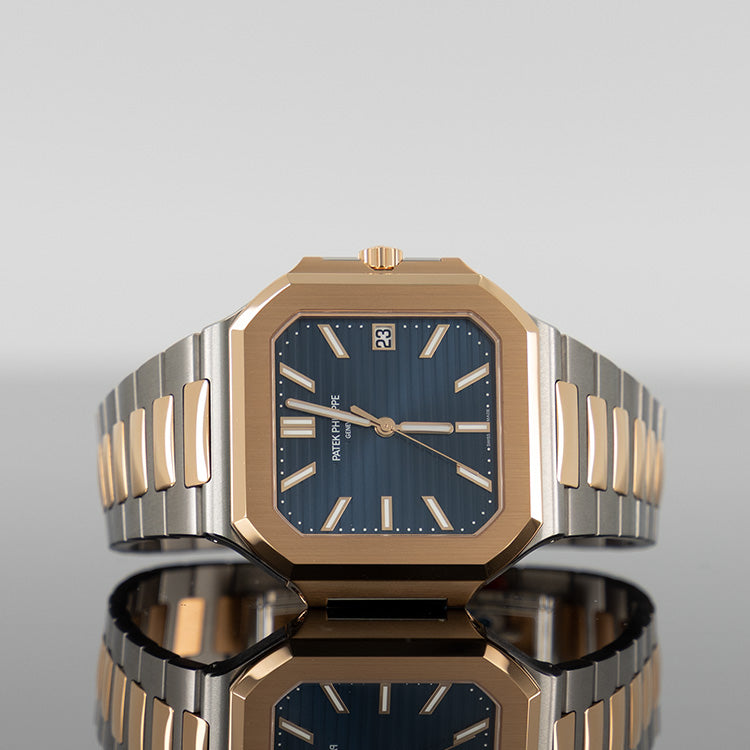 Patek Philippe 5821/1AR 001 Cubitus — Gold Sunburst Blue Dial Steel 45mm