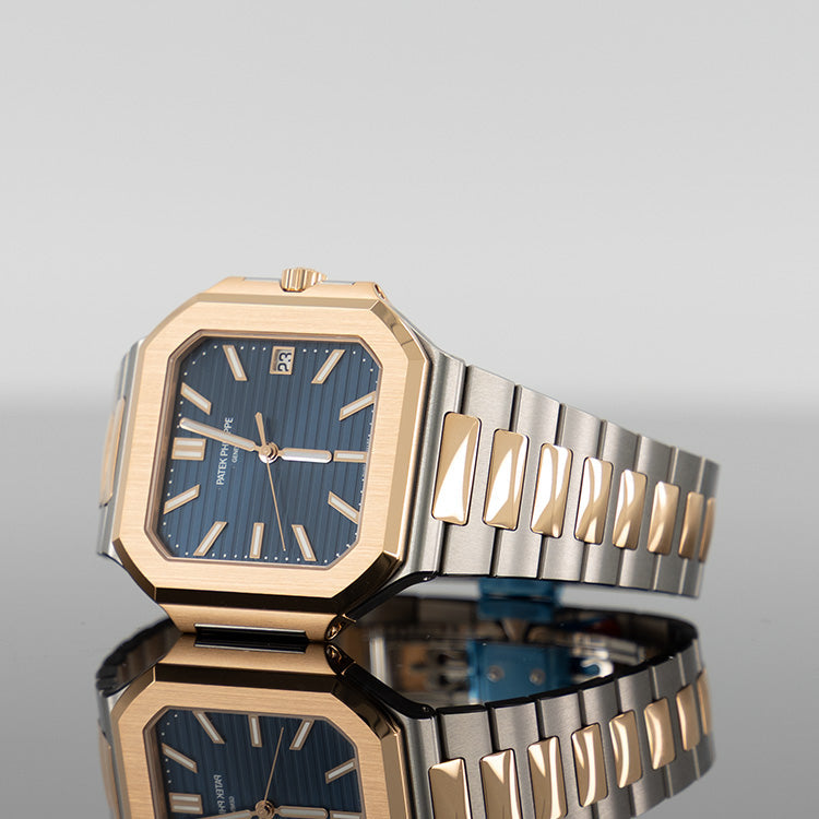Patek Philippe 5821/1AR 001 Cubitus — Gold Sunburst Blue Dial Steel 45mm