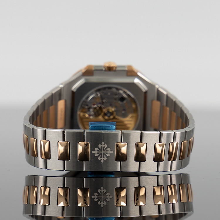 Patek Philippe 5821/1AR 001 Cubitus — Gold Sunburst Blue Dial Steel 45mm