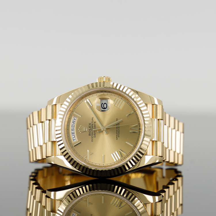 Rolex Day-Date 228238 — Gold Champagne Roman Dial Yellow Gold 40mm