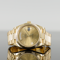 Rolex Day-Date 228238 — Gold Champagne Roman Dial Yellow Gold 40mm