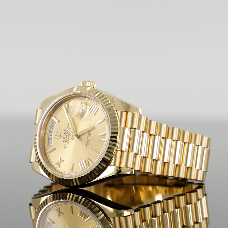 Rolex Day-Date 228238 — Gold Champagne Roman Dial Yellow Gold 40mm