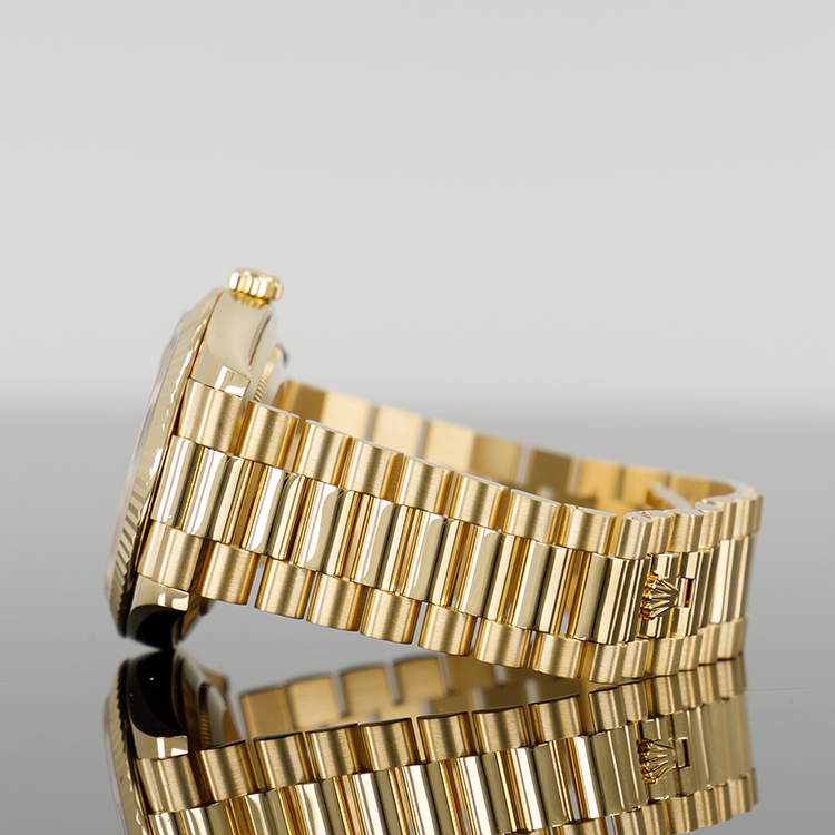 Rolex Day-Date 228238 — Gold Champagne Roman Dial Yellow Gold 40mm