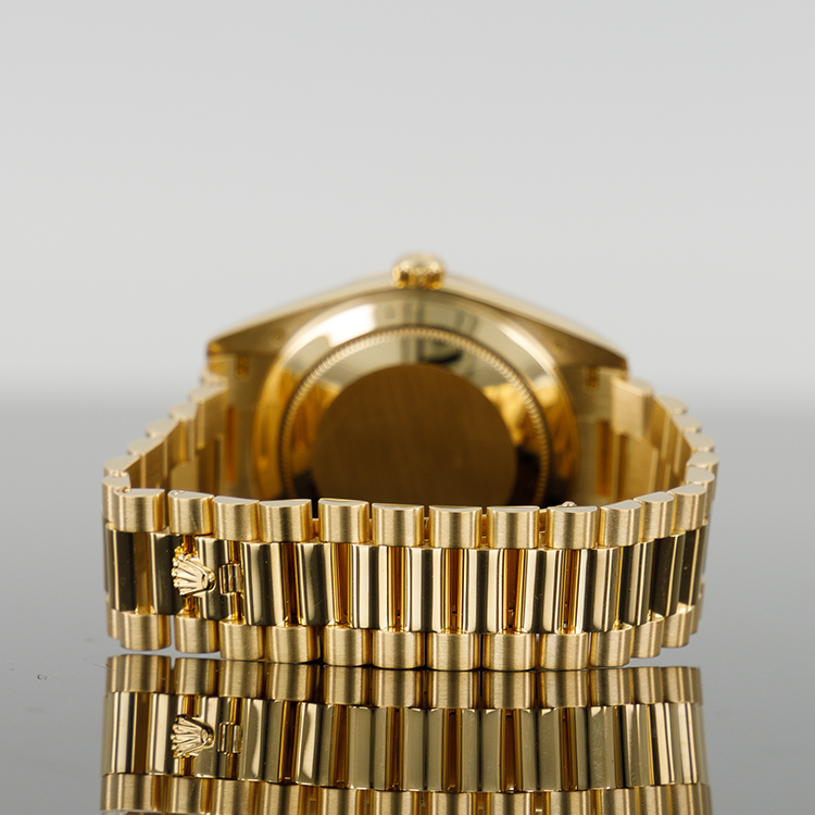 Rolex Day-Date 228238 — Gold Champagne Roman Dial Yellow Gold 40mm
