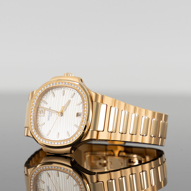 Patek Philippe Nautilus — Gold Diamond Bezel White Dial Rose Gold Diamond 35.2mm