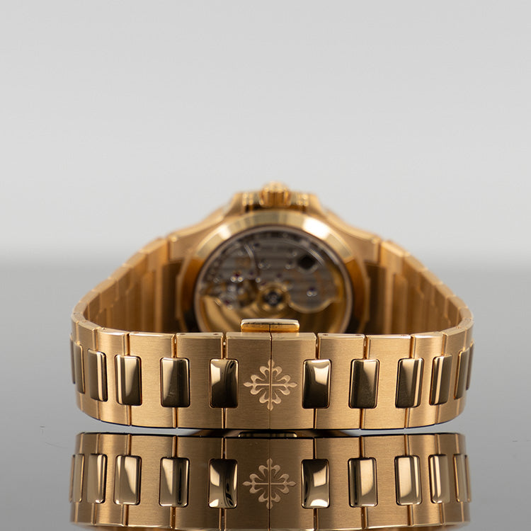 Patek Philippe Nautilus — Gold Diamond Bezel White Dial Rose Gold Diamond 35.2mm