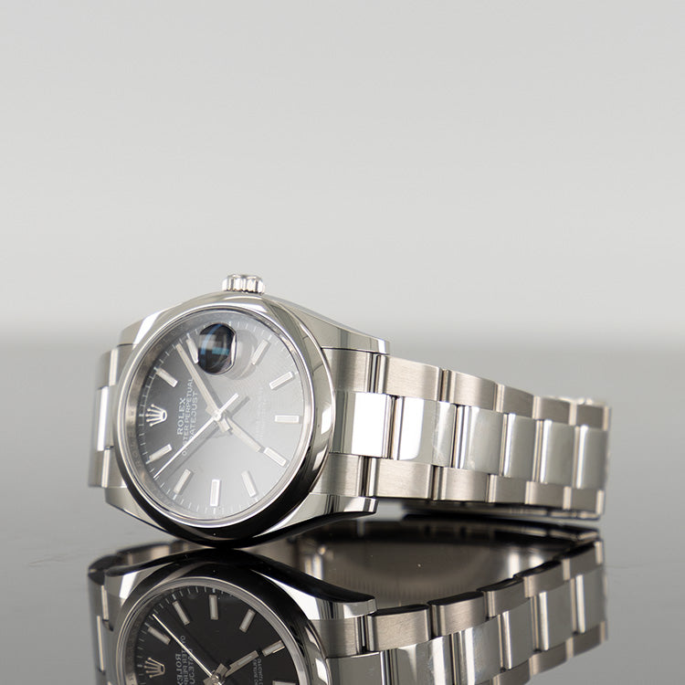 Rolex Datejust 126200 — Black Dial Oystersteel 36mm