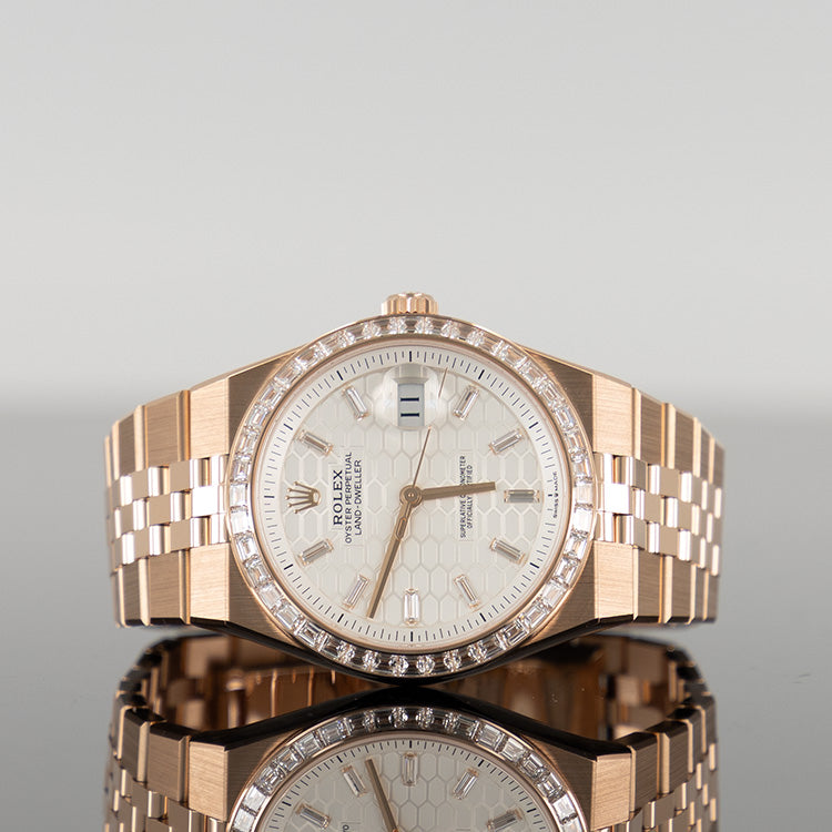 Rolex Land Dweller Rose 127385TBR — Gold Honeycomb Motif Baguette Dial Rose Gold Diamond Baguette 40mm