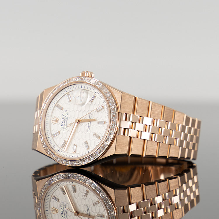 Rolex Land Dweller Rose 127385TBR — Gold Honeycomb Motif Baguette Dial Rose Gold Diamond Baguette 40mm
