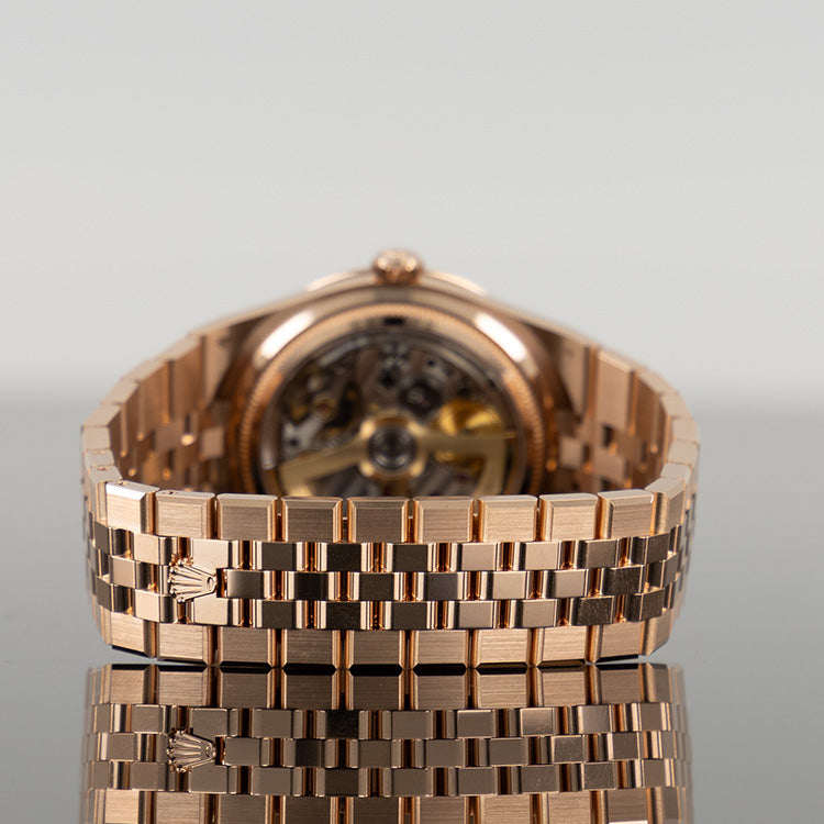 Rolex Land Dweller Rose 127385TBR — Gold Honeycomb Motif Baguette Dial Rose Gold Diamond Baguette 40mm