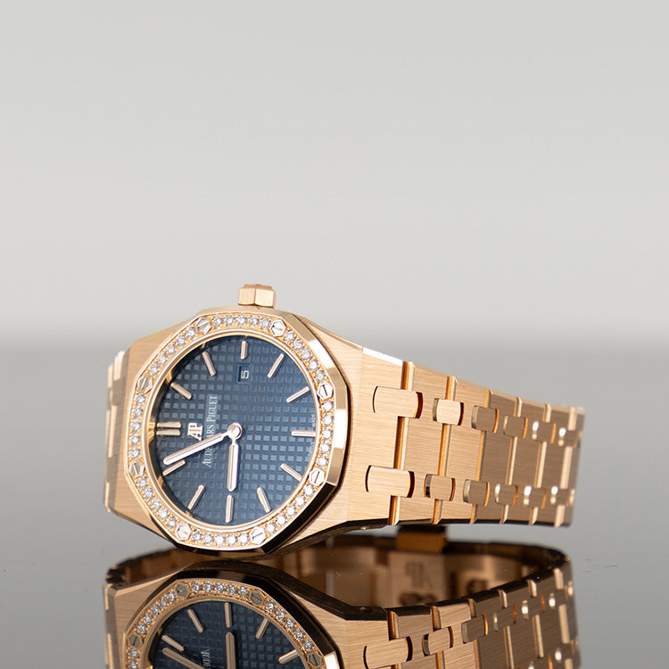 Audemars Piguet Royal Oak 67651OR — Rose Gold Blue Dial Rose Gold Diamond 33mm