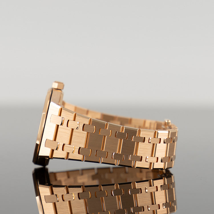 Audemars Piguet Royal Oak 67651OR — Rose Gold Blue Dial Rose Gold Diamond 33mm